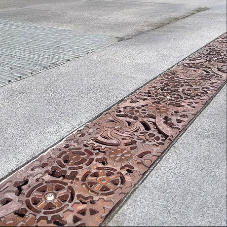 How Do DYNAMO Trench Grates Support Effective Drainage?