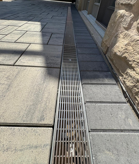 Successful Project Spotlight: Trench Drain and Stainless Steel Longitudinal Grating for a Kitchener Waterloo Landscaping Project