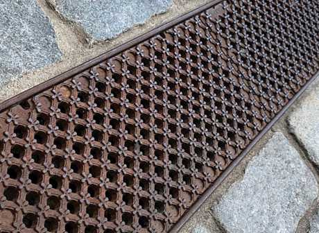 How Do Flower Grid Trench Grates Add Decorative Appeal?