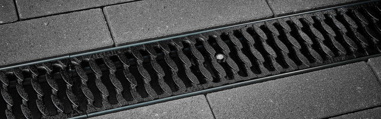 ANRIN Slotted OvalGrip ADA Ductile-Iron Grating D Load - ANRIN