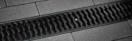 ANRIN Slotted OvalGrip ADA Ductile-Iron Grating D Load - ANRIN