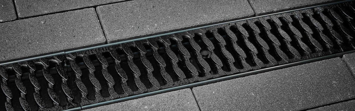 ANRIN Slotted OvalGrip Ductile Iron Grating F Load - ANRIN