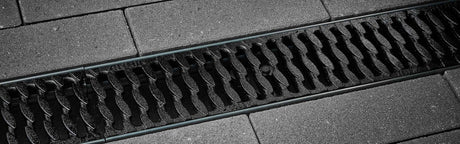 ANRIN Slotted OvalGrip Ductile Iron Grating F Load - ANRIN